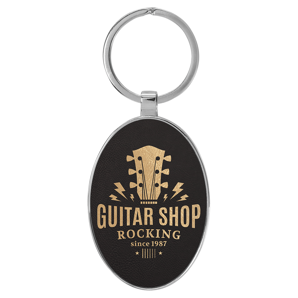 Black/Gold 3" x 1 3/4" Laserable Leatherette/Metal Oval Keychain